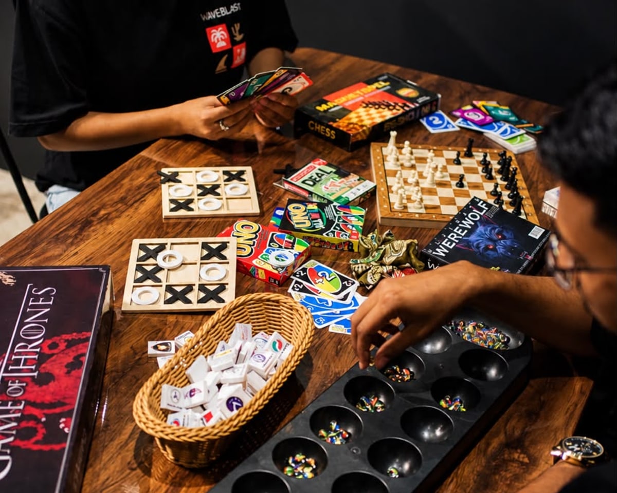 Guests playing table games together at Xerom
